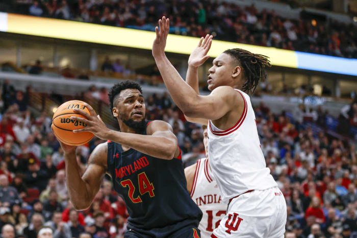 Maryland's Donta Scott (24) drives to the basket against Indiana Hoosiers forward Malik Reneau (5).
